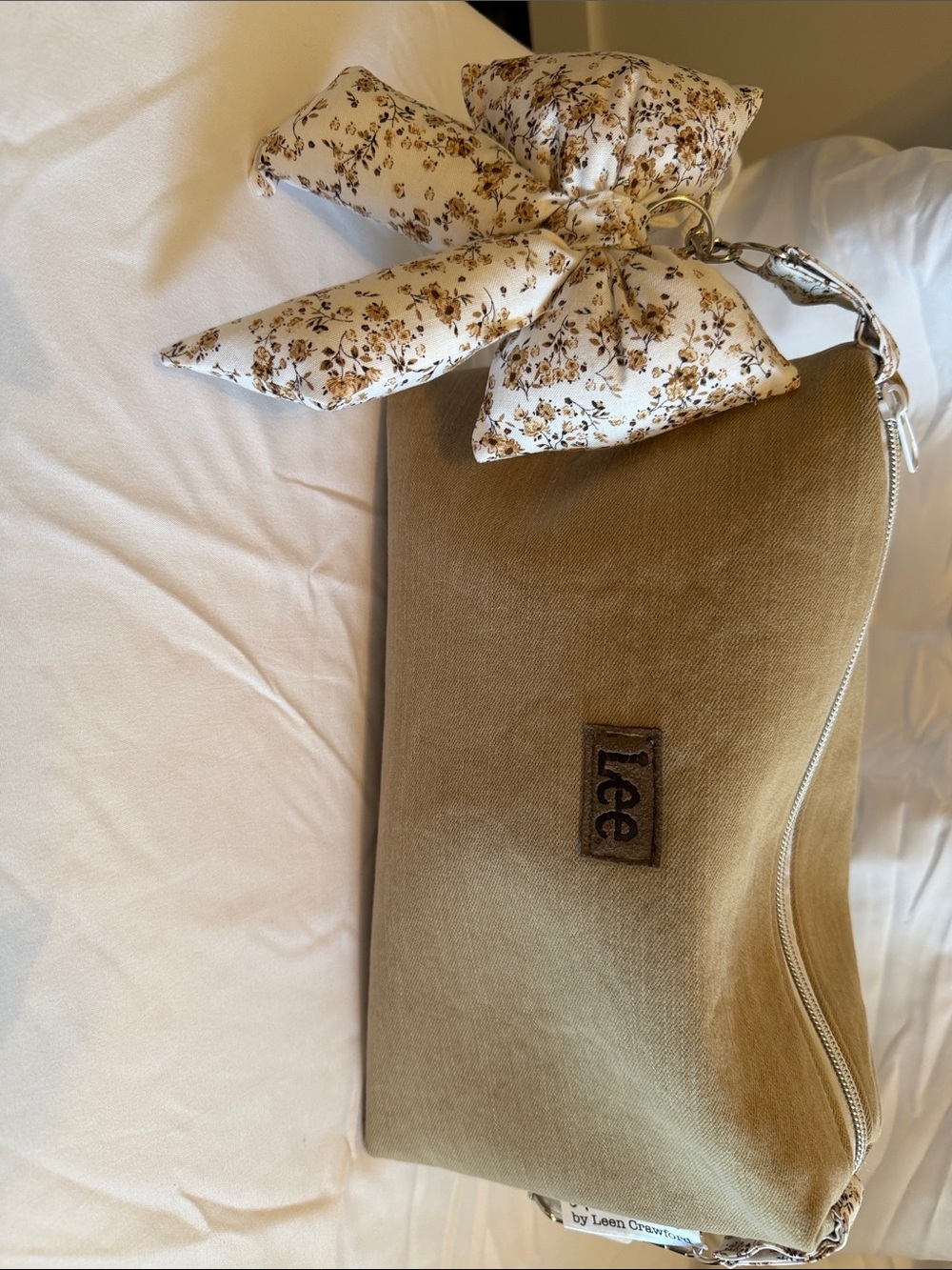 Lee Tan Canvas Wristlet with Floral Bow Accent